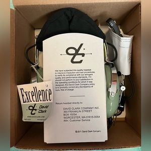 New David Clark H10-76 headset, mic covers, splitter cord, carrying case.